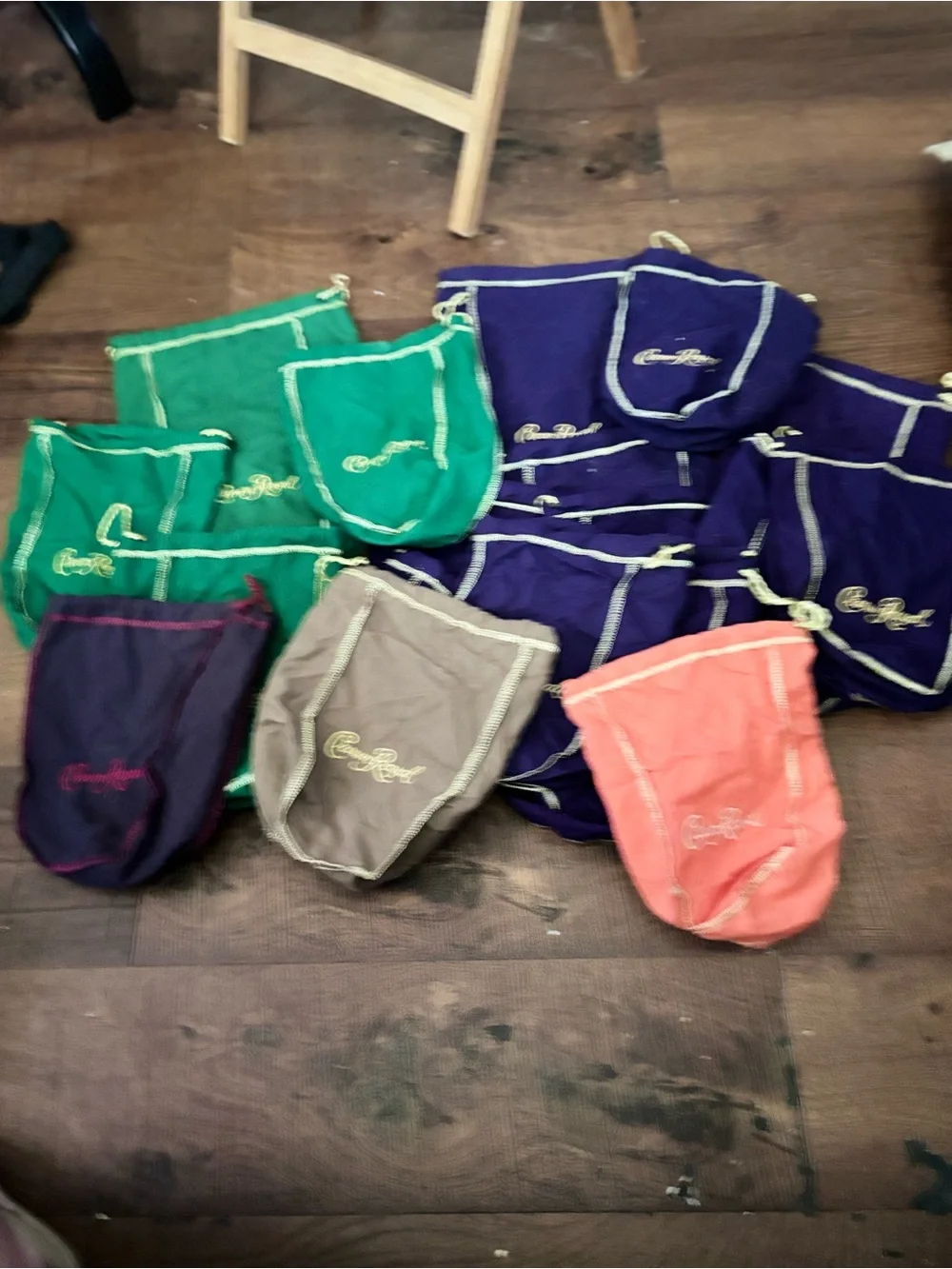 Crown Royal Bags. 1 lg 12 sm Purple, 1 lg 3 sm Green, 1 navy, 1 Vanilla, 1Peach